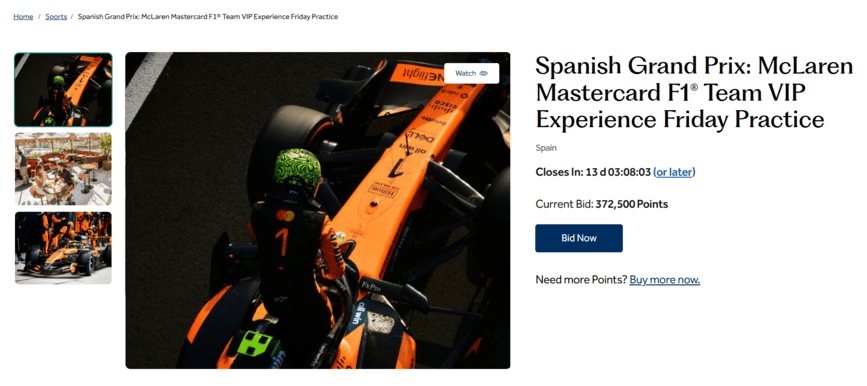 Hilton Honors auction listing for a McLaren F1 VIP experience, showing current bid, countdown timer, and "Bid Now" button.