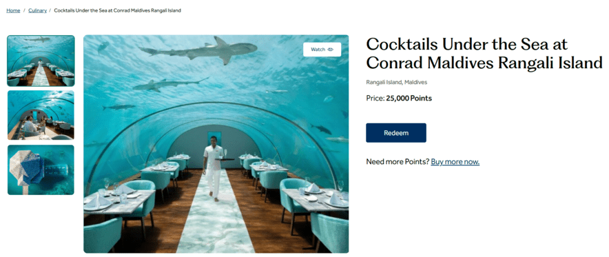 Hilton Honors Experiences listing for an underwater dining event at Conrad Maldives, priced at 25,000 points with a "Redeem" button.