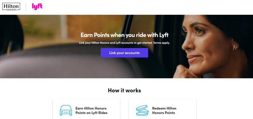 Hilton Honors and Lyft co-branded banner with a "Link your accounts" button and panels explaining earning and redeeming points on rides